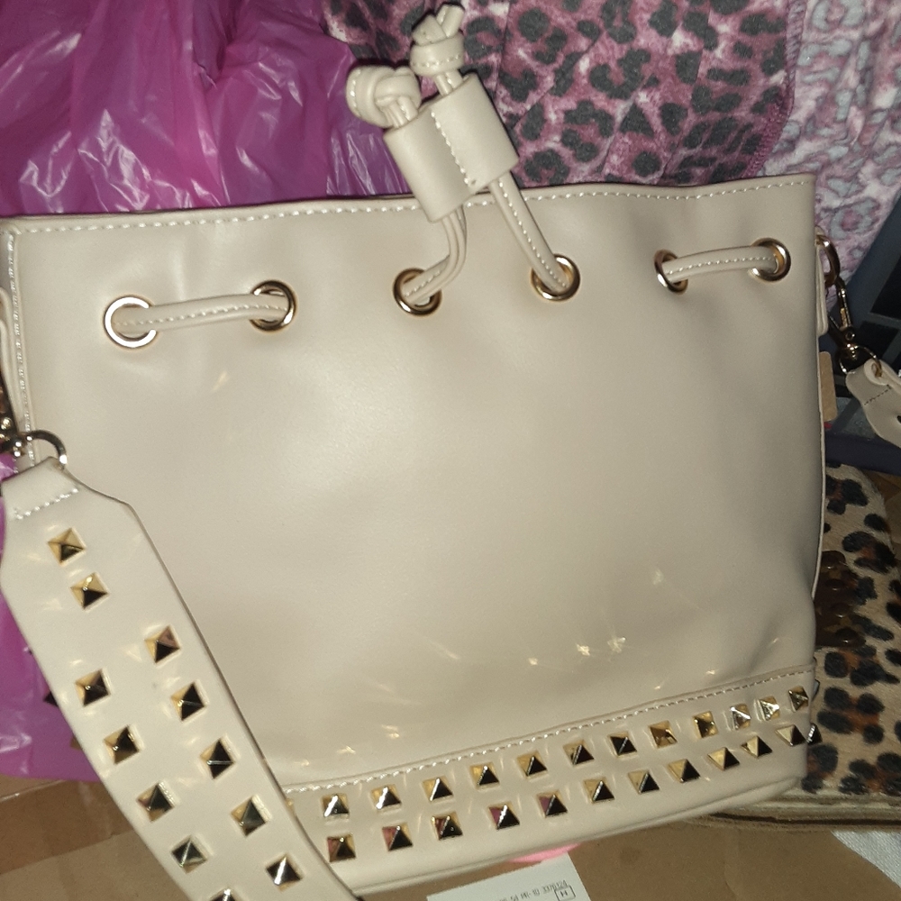 Tan studded drawstring bag